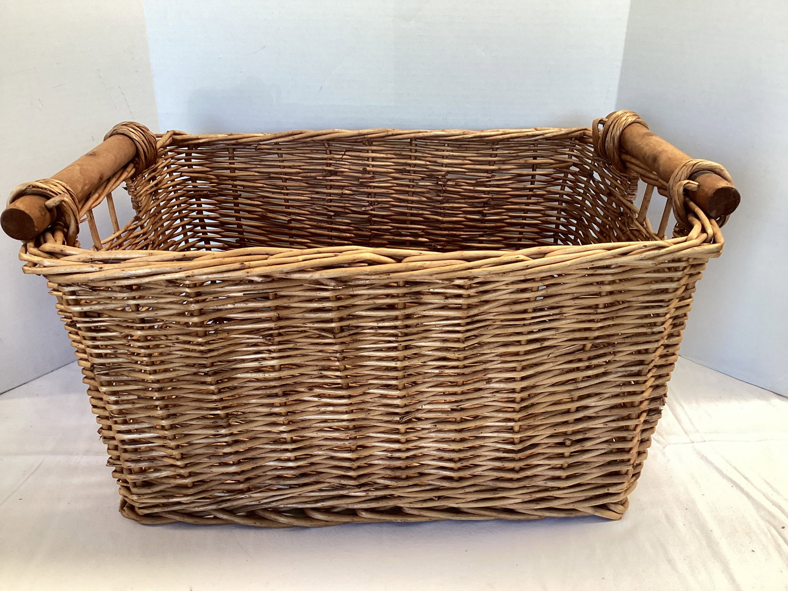 Large Basket with Wood Handles: 24" x 16 1/2" x 13" h, shipping unavailable for this lot 