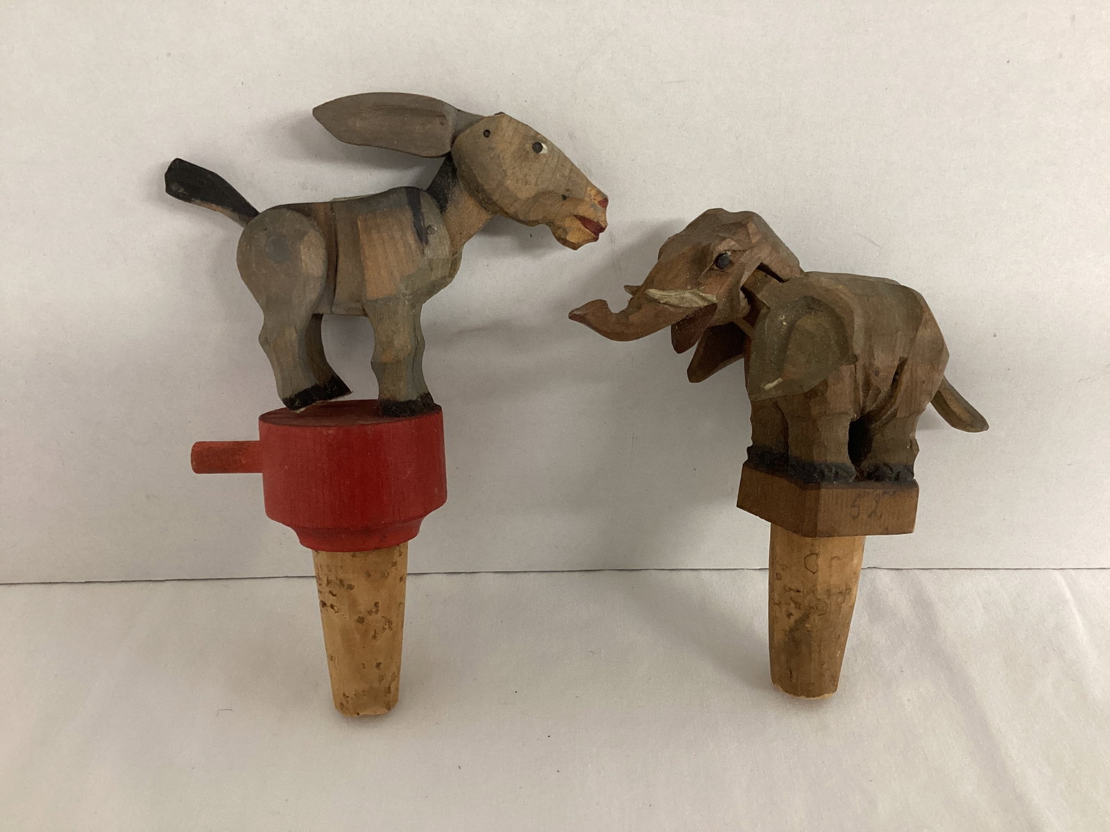 Wood Carved Mechanical Donkey and Elephant Bottle Stoppers (1 of 5)