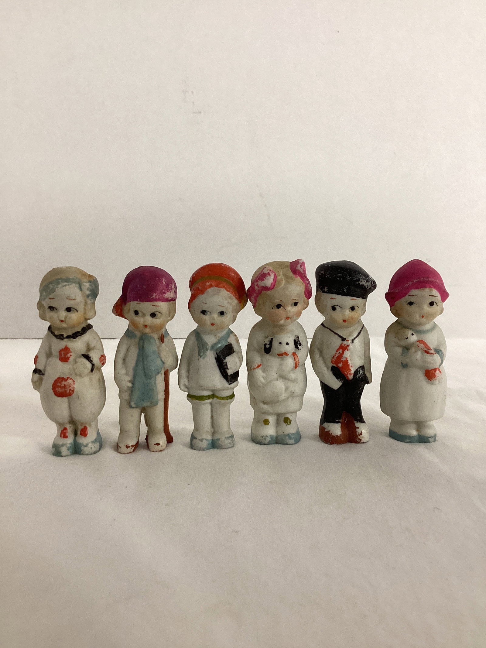 Six Bisque Children Figurines Made in Japan: 3" h