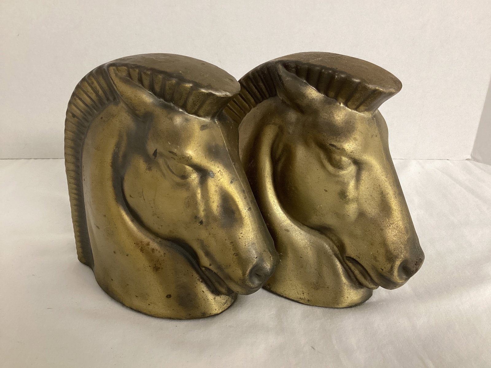 Pair of Vintage Metal Horse Head Bookends: 6 1/4" h, one cracked