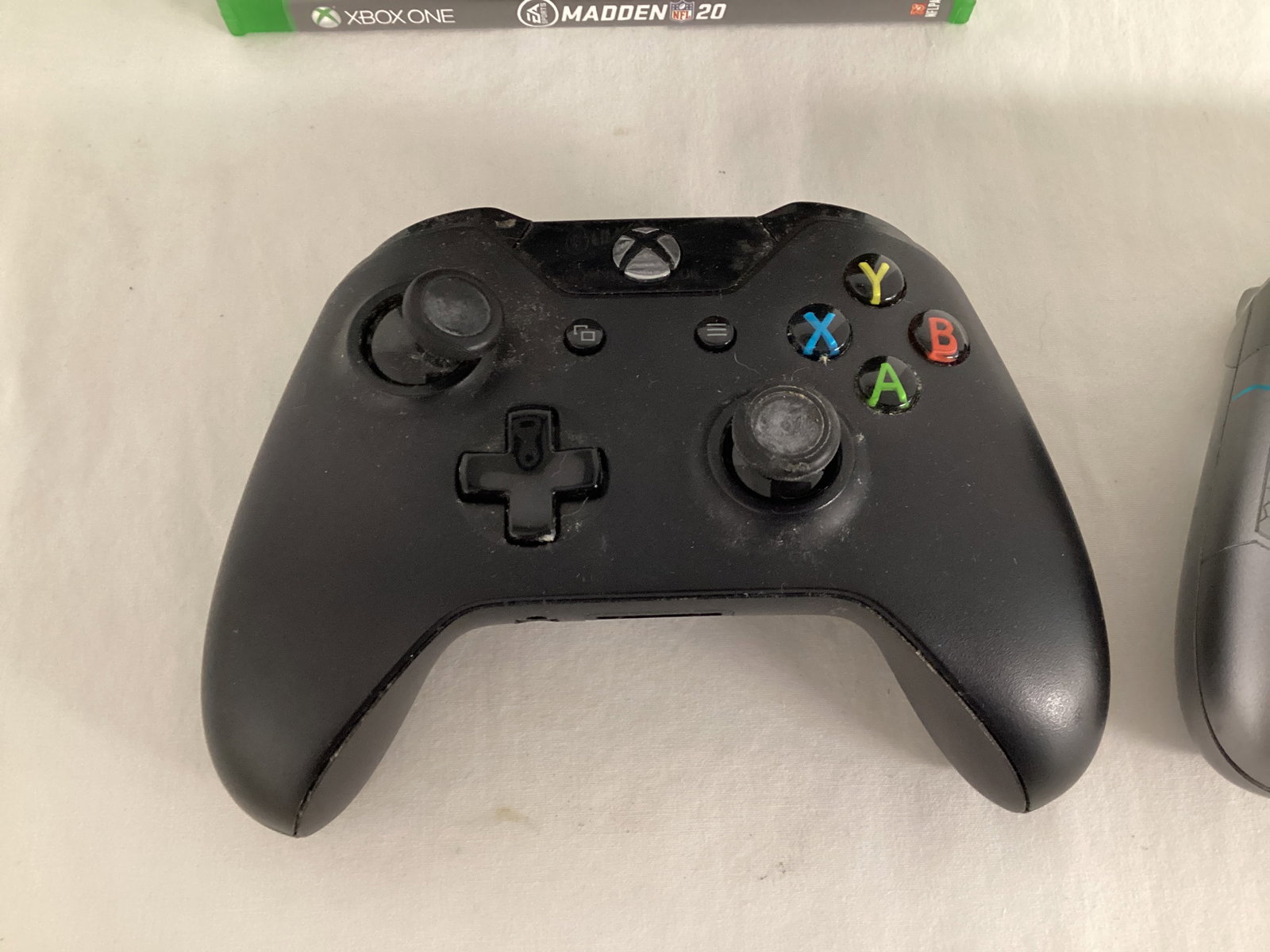 Two Xbox Controllers and Xbox One Games - 2