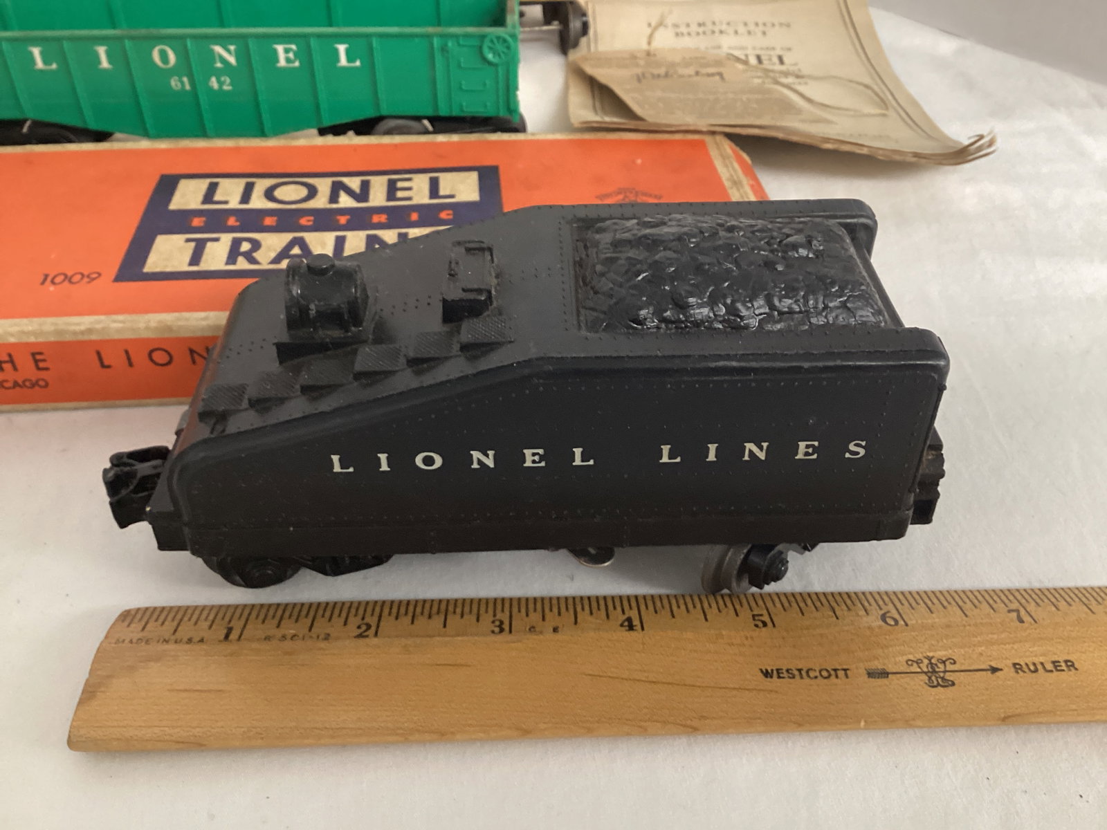 Lionel Train Cars and One Track Piece - 4