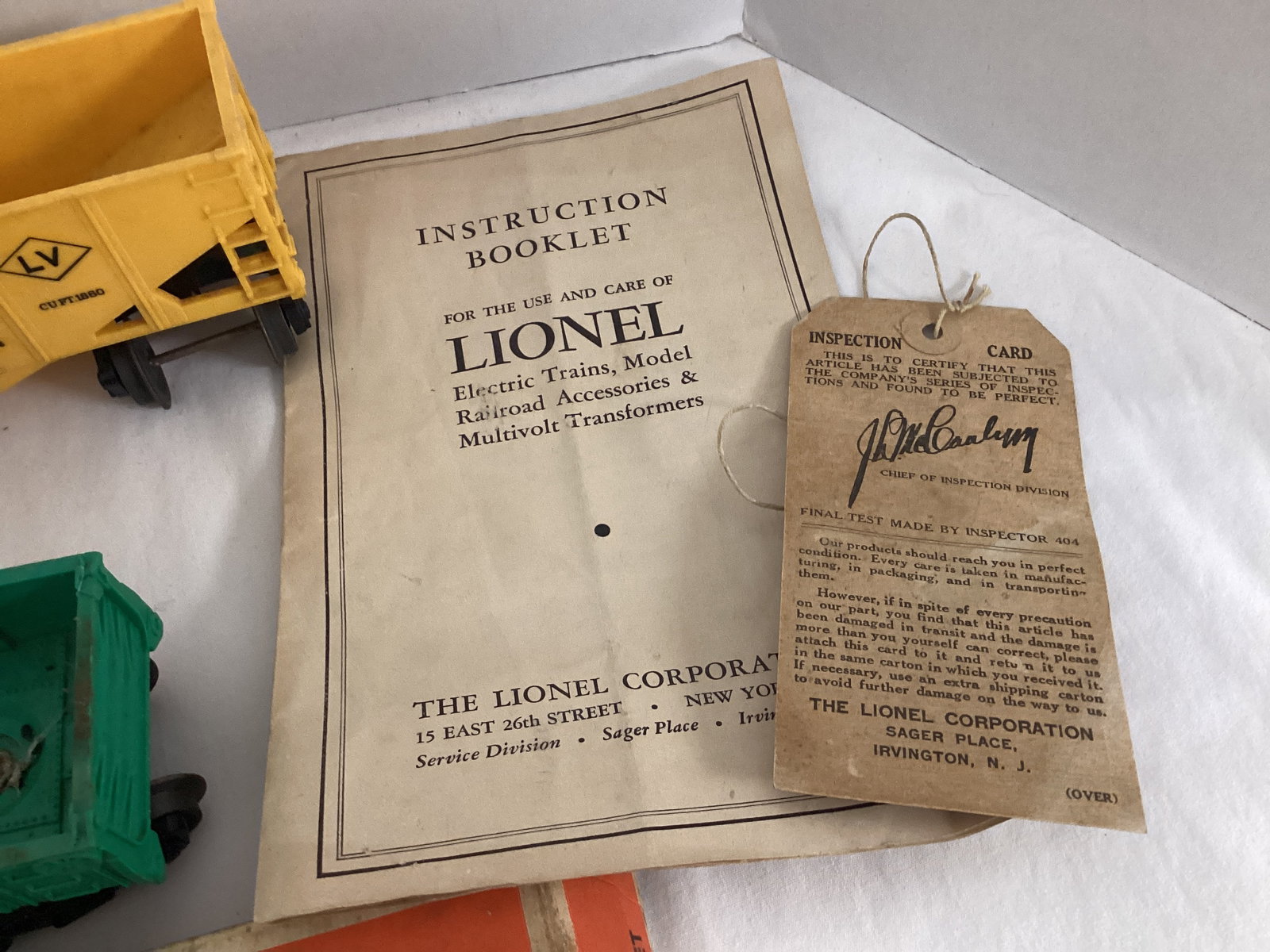 Lionel Train Cars and One Track Piece - 8