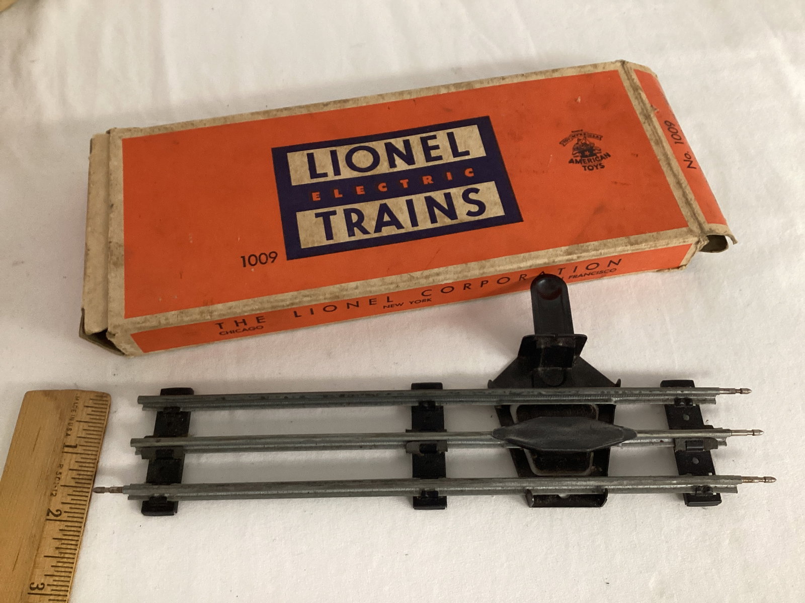 Lionel Train Cars and One Track Piece - 9