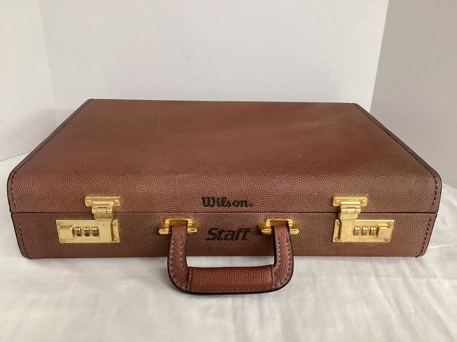 Wilson NFL Football Grain Staff Briefcase: .