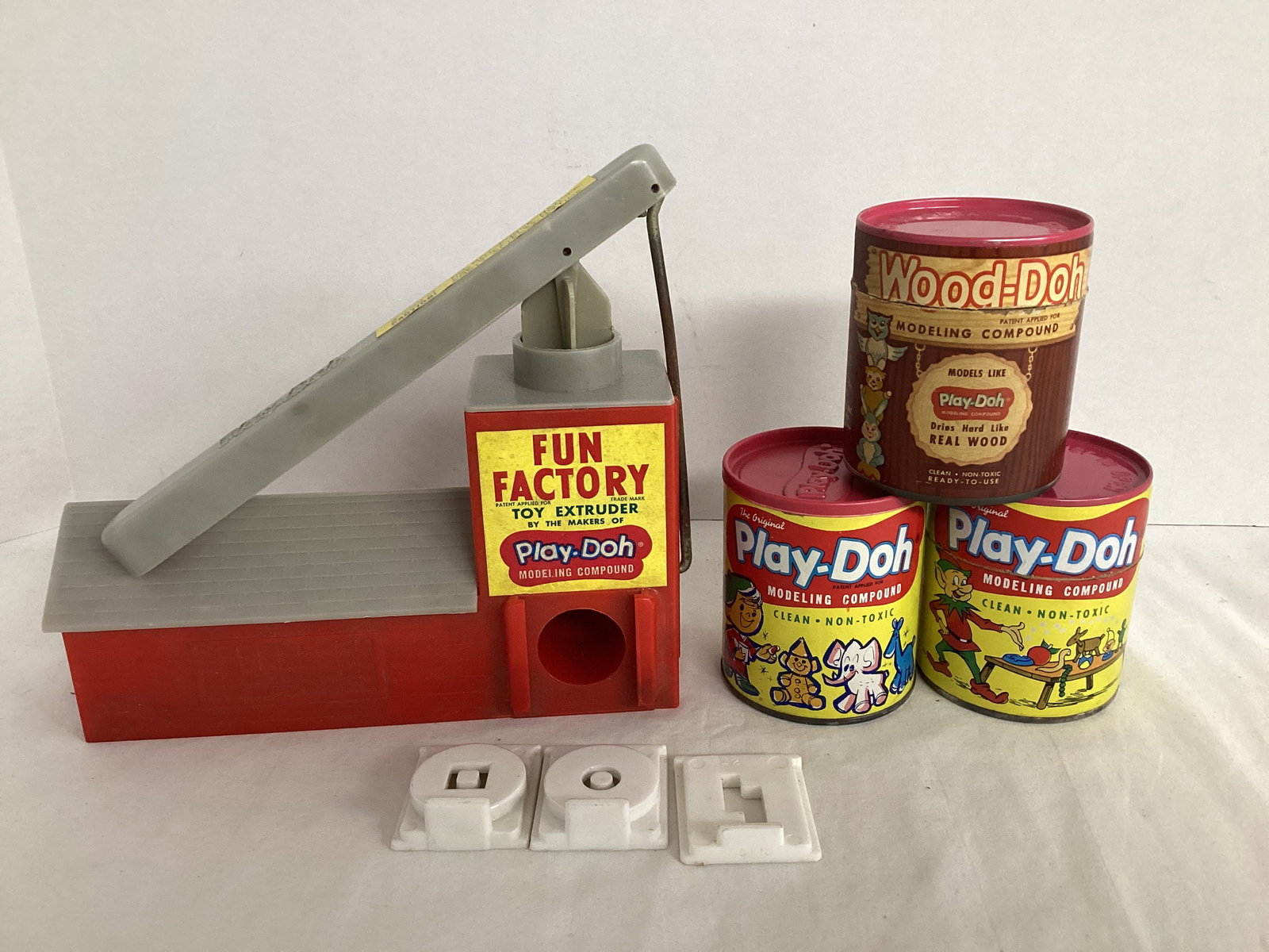 Vintage Play-Doh Fun Factory and Play-Doh Cans: contents dried, one can is Wood-Doh