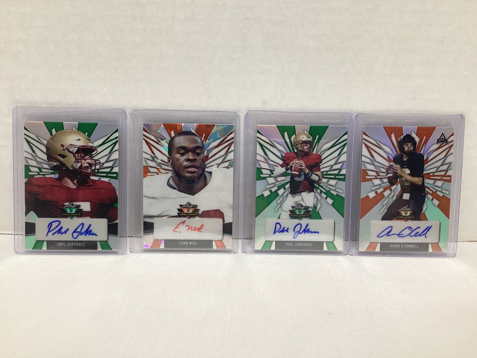 Four Leaf Valiant Autographed Football Cards: .