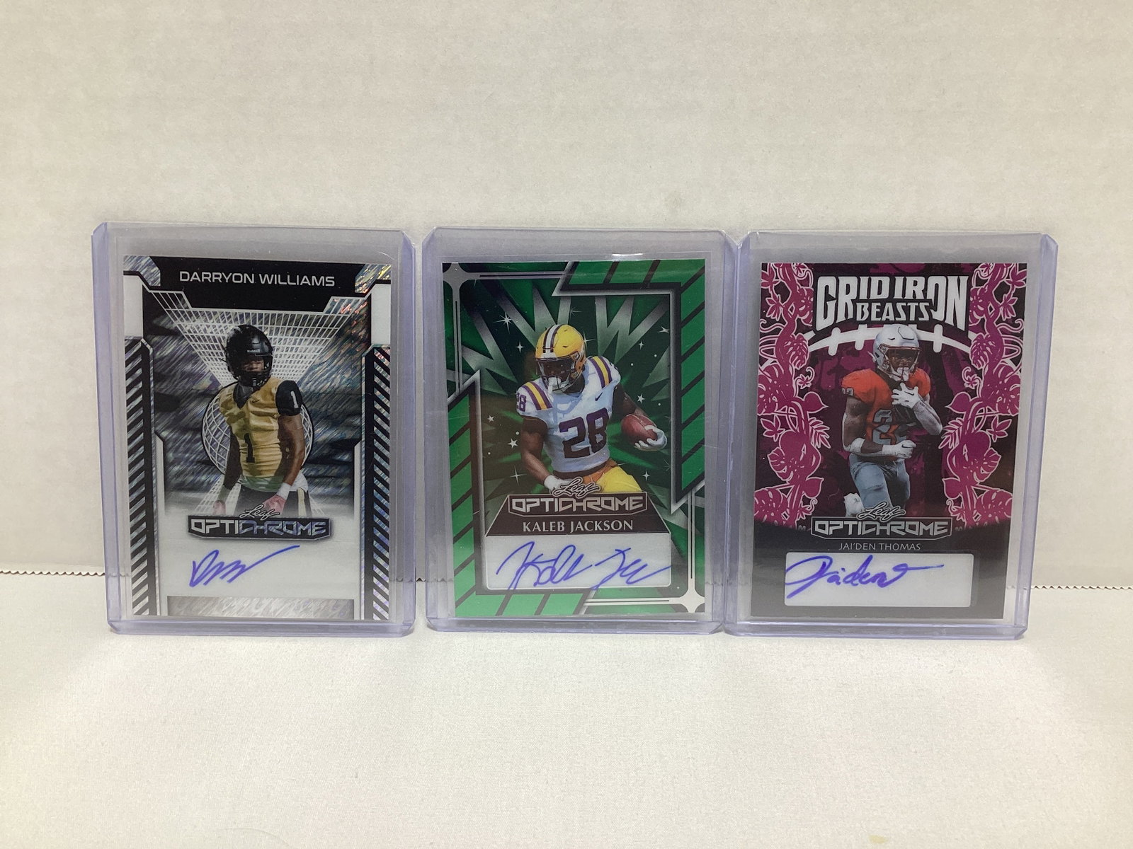 Three Leaf Optichrome Autographed Football Cards: .