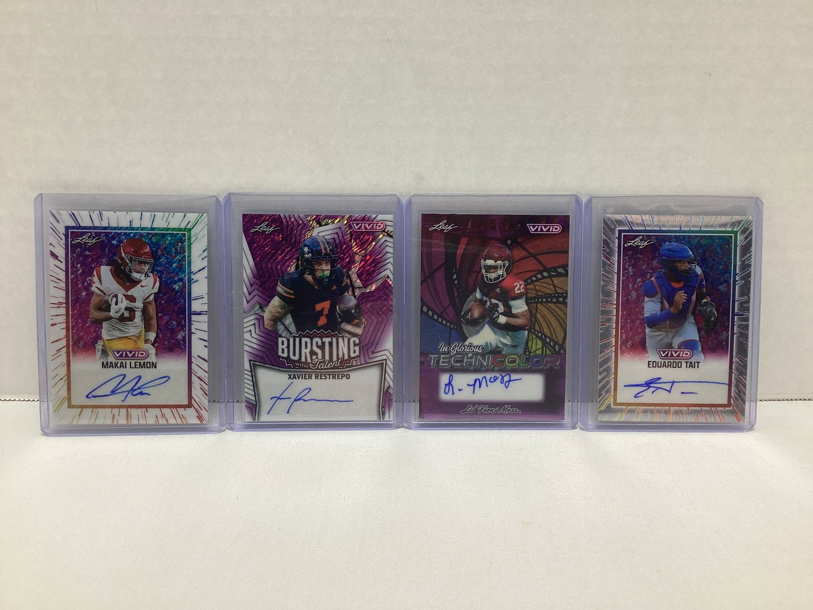 Four Leaf Vivid Autographed Football Cards: .