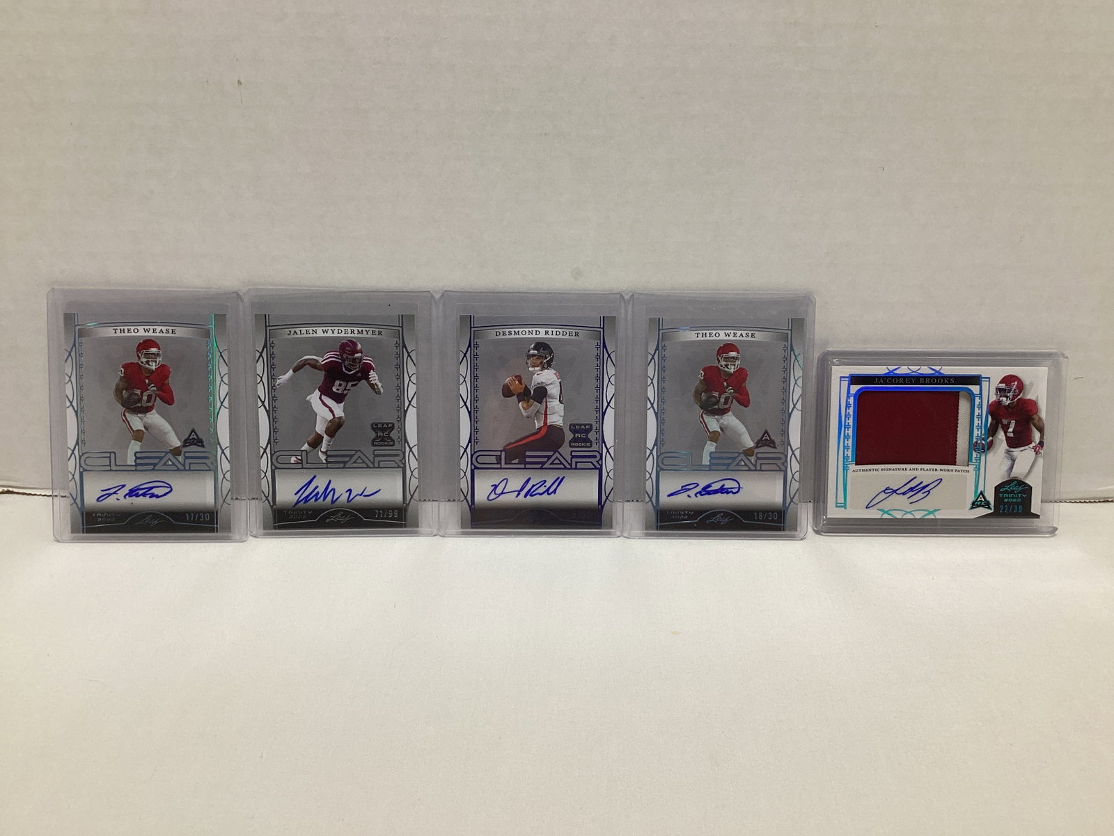 Five Leaf Trinity Autographed Football Cards: .