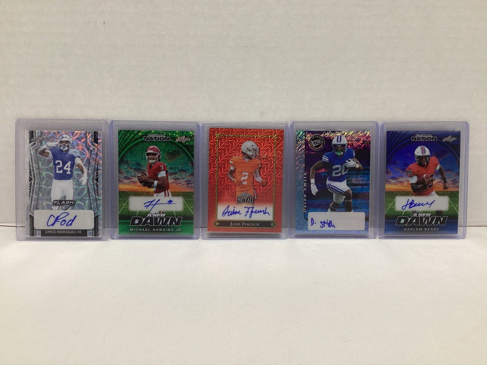 Five Leaf Autographed Football Cards: .