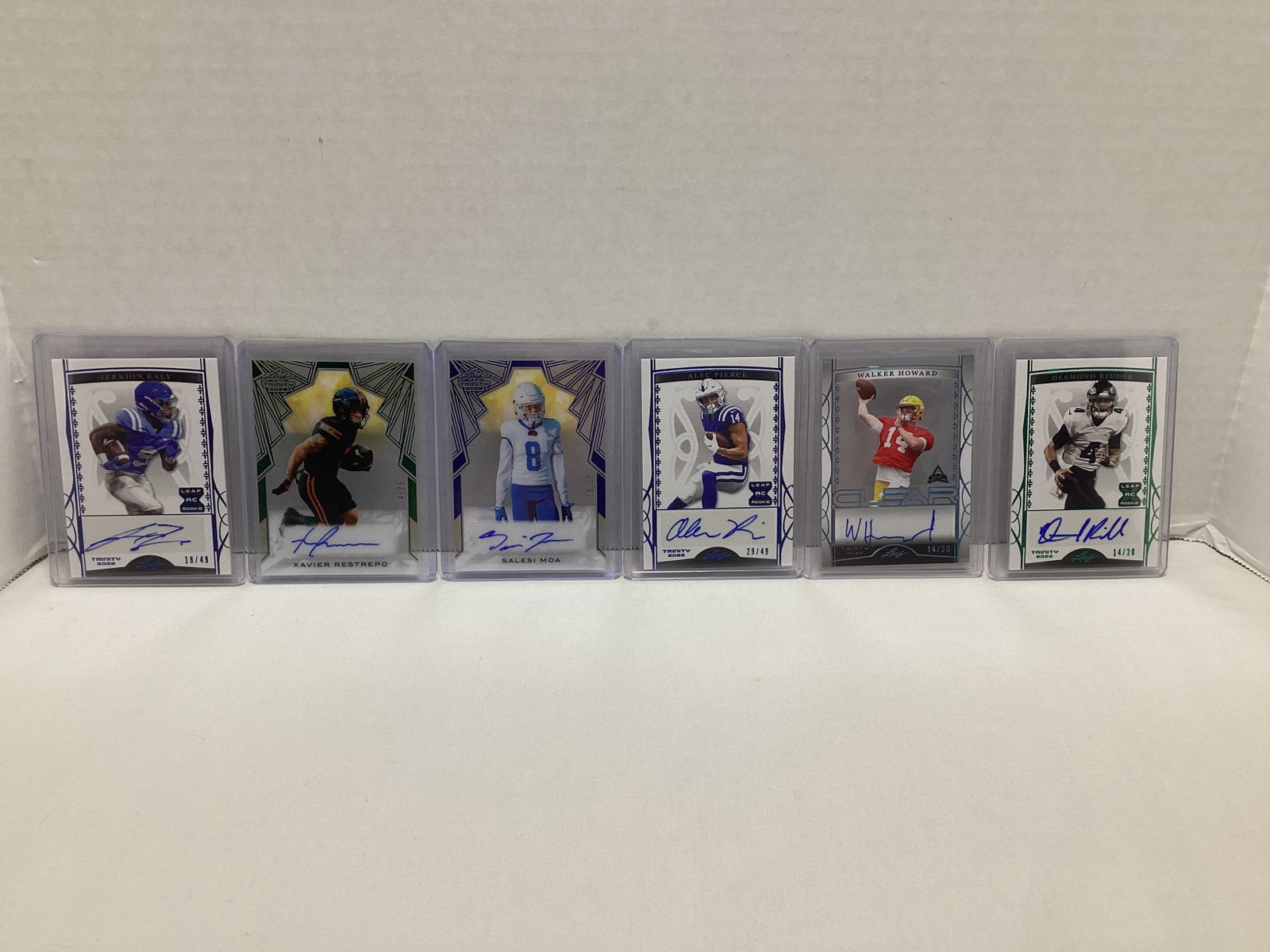 Six Leaf Trinity Autographed Football Cards: .