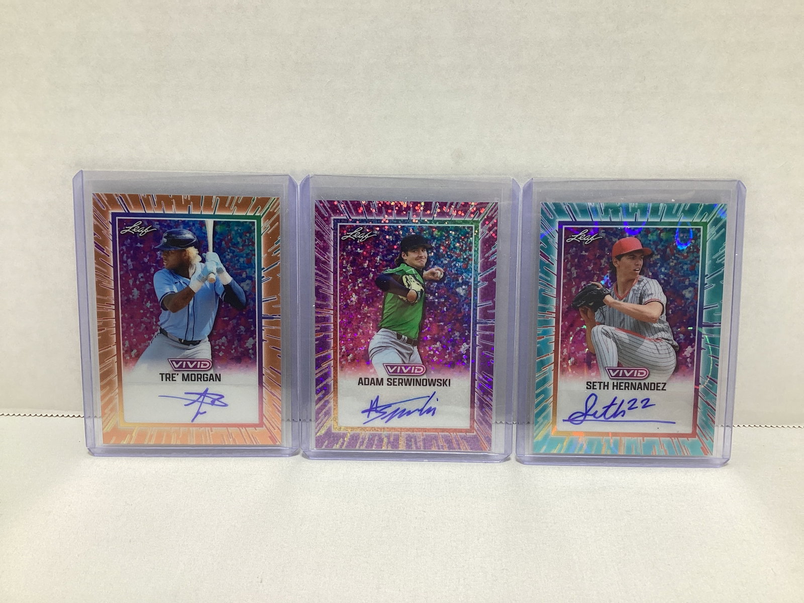 Three Leaf Vivid Autographed Baseball Cards: .