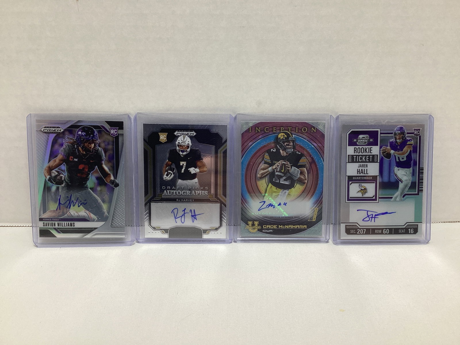 Four Autographed Football Cards: .