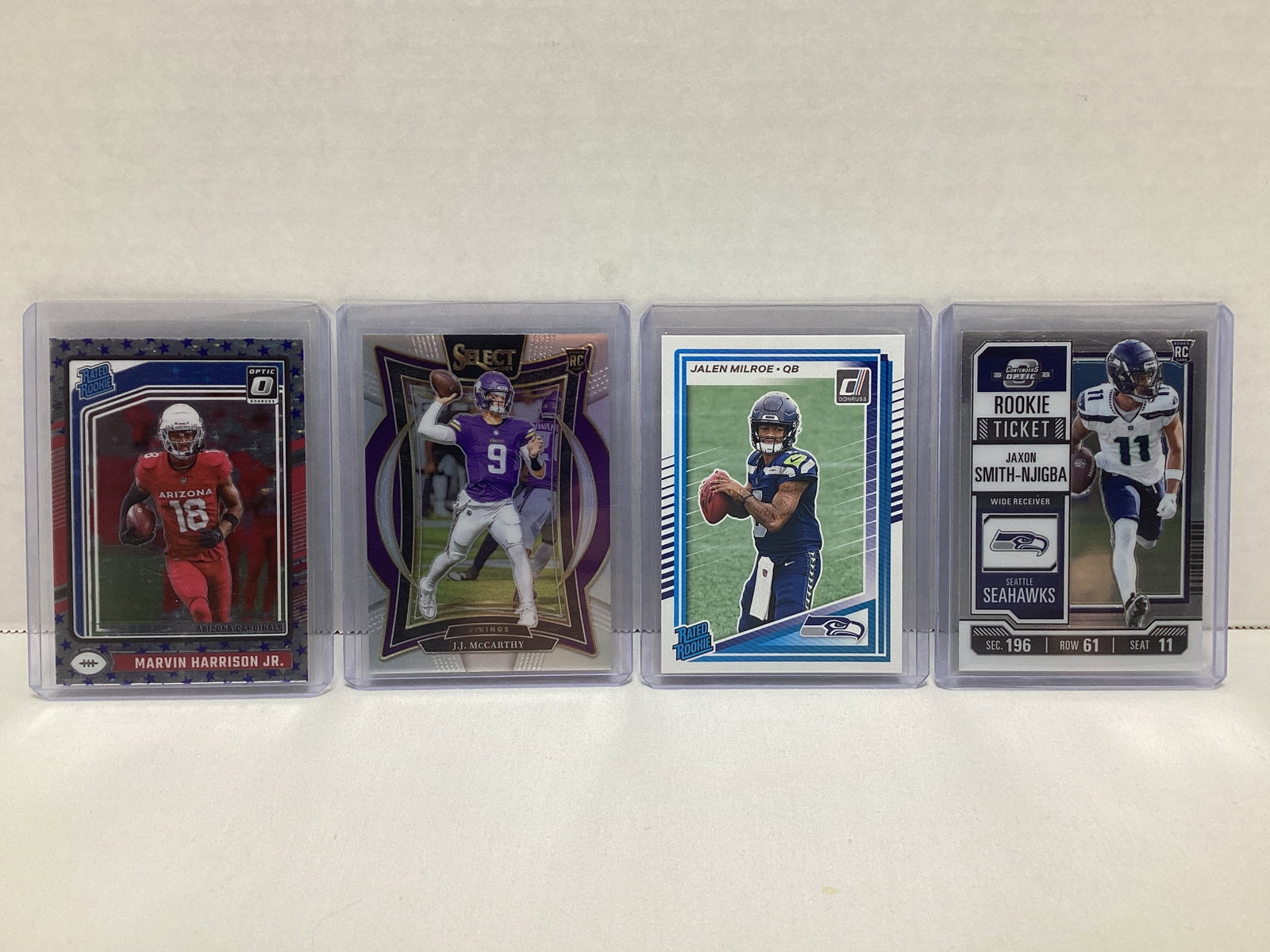 Four Panini NFL Football Rookie Cards: .