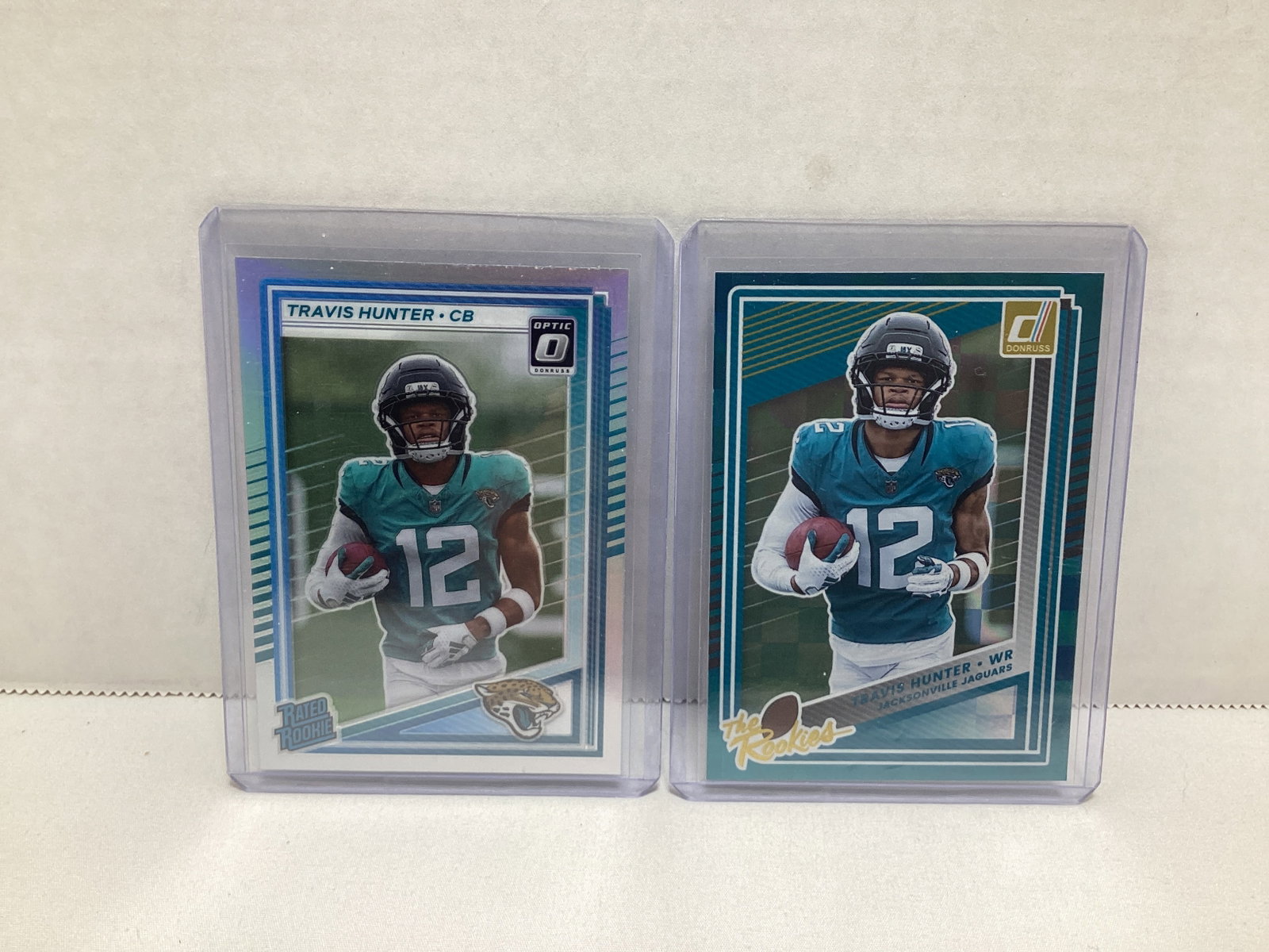 Two Travis Hunter Rookie Cards: .
