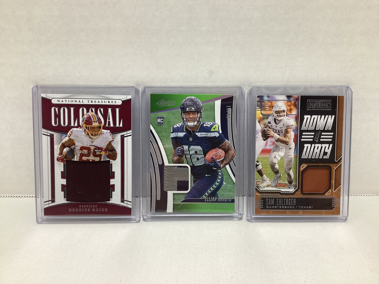 Three Panini Material Football Cards (1 of 2)