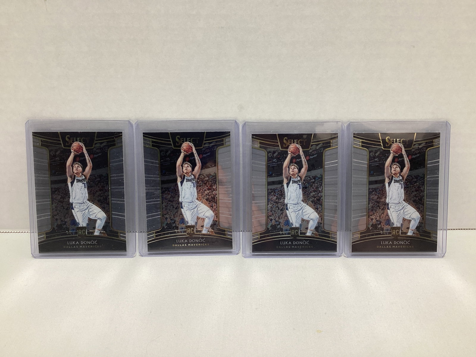Four Panini Select Luka Doncic Rookie Cards: .