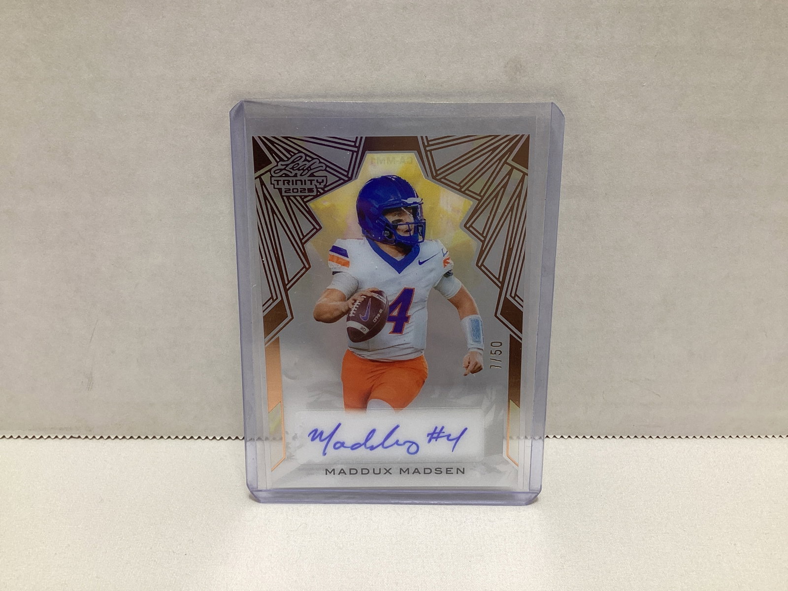 2025 Leaf Trinity Maddux Madsen Autographed 7/50 Football Card: .