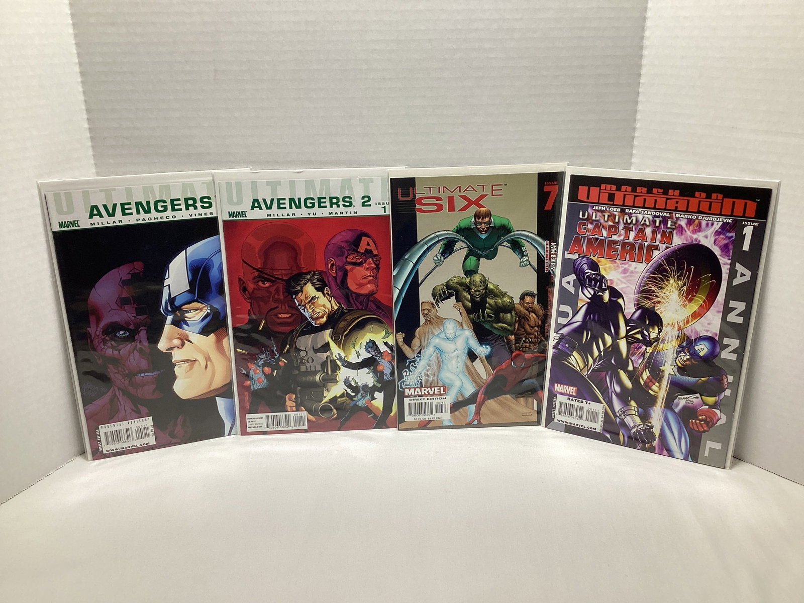 Four Ultimate Marvel Comic Books (1 of 3)