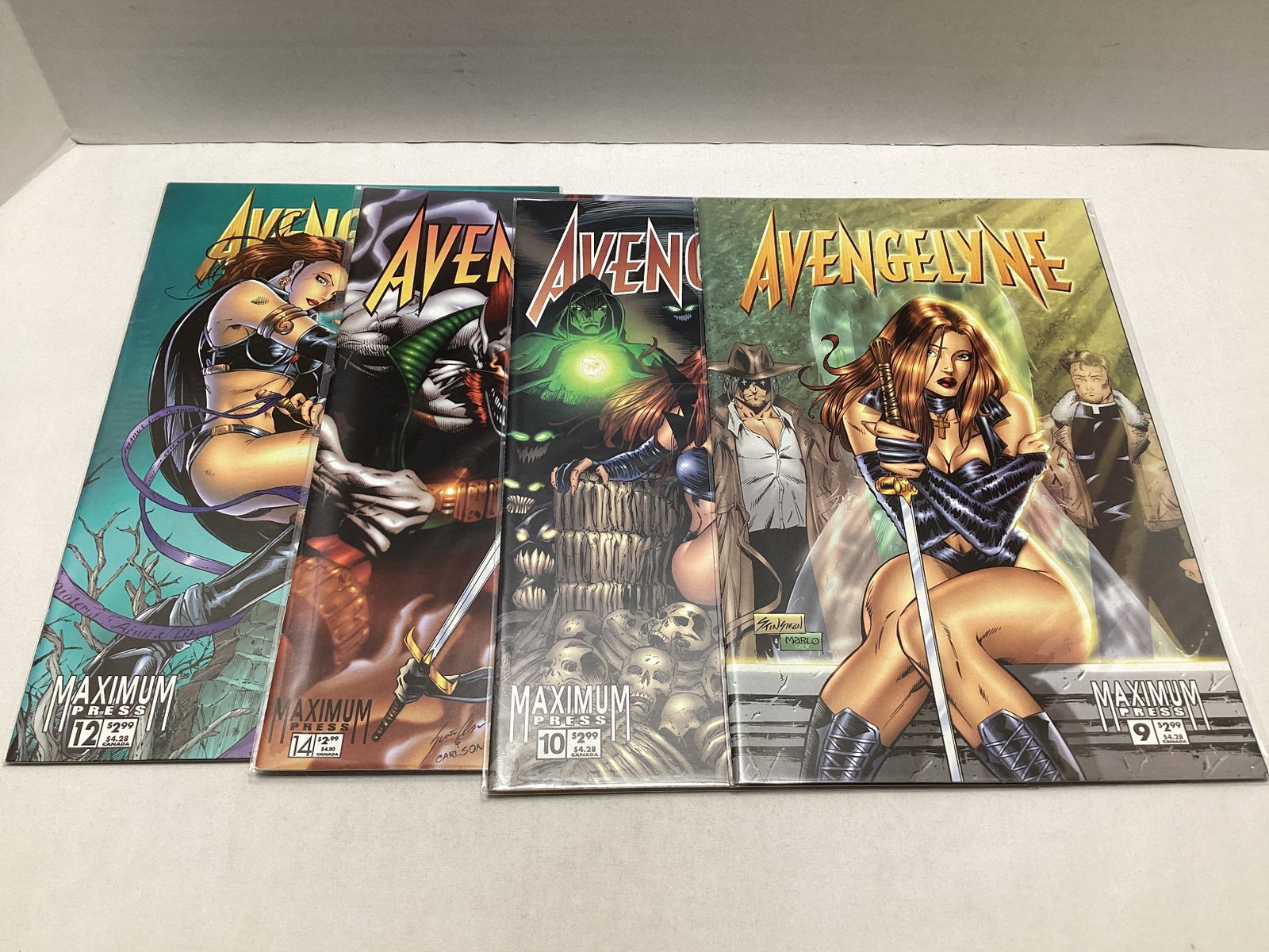 Four Avengelyne Maximum Comic Books: please preview and see all photos for condition
