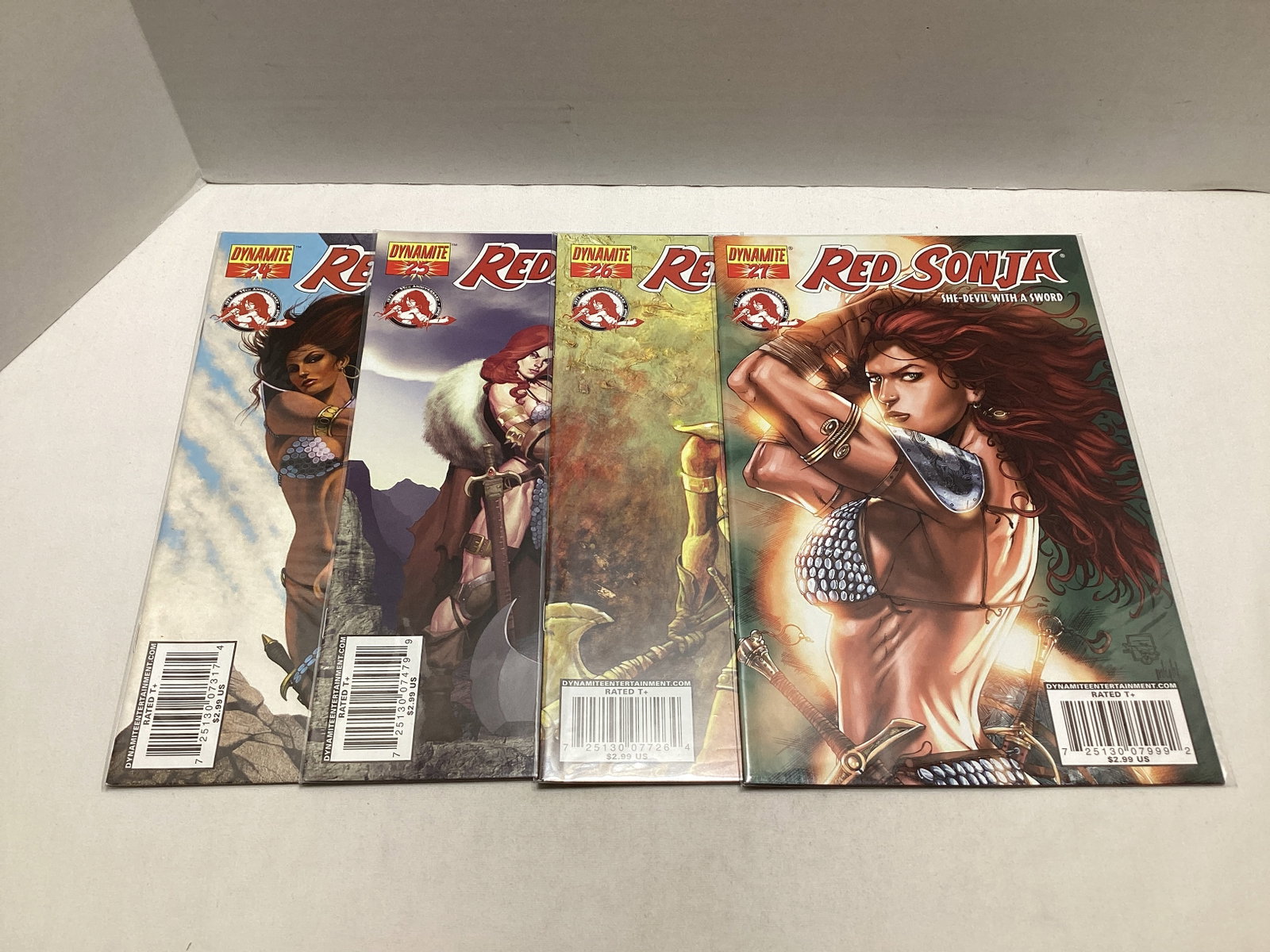 Four Red Sonja Dynamite Comic Books: please preview and see all photos for condition