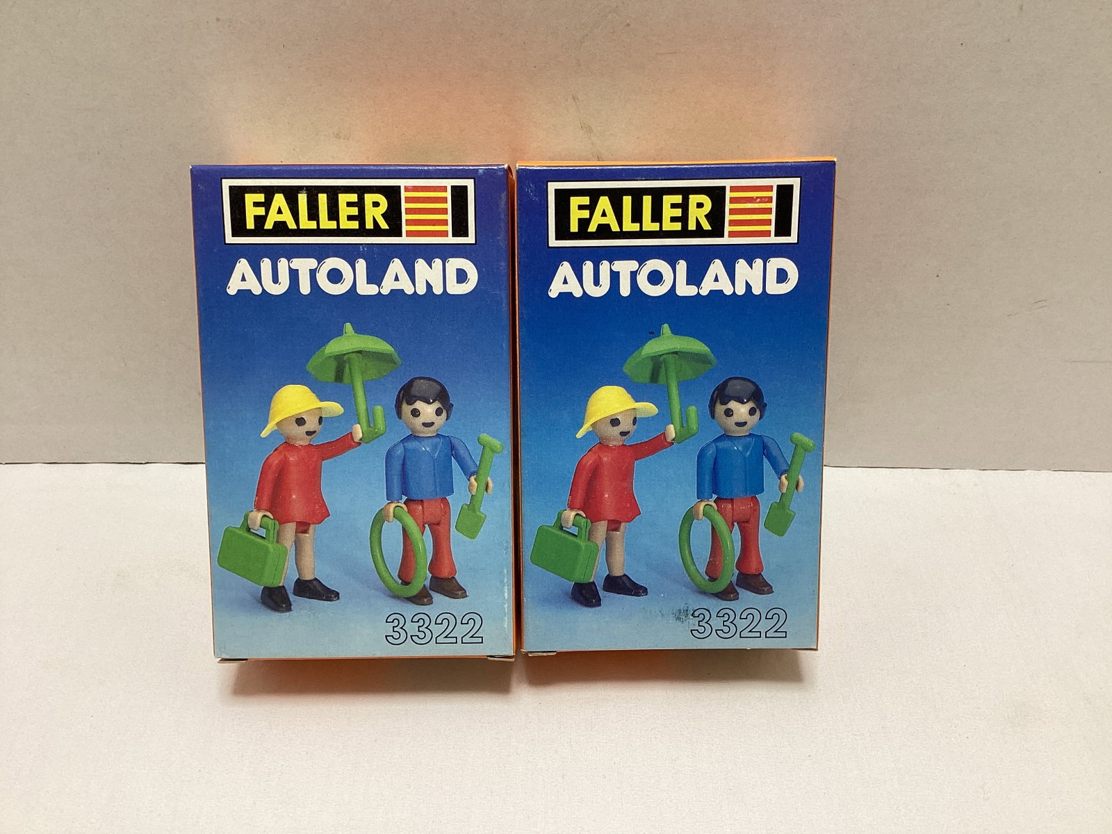 Two Faller Autoland 3322 Figures: made in Western Germany