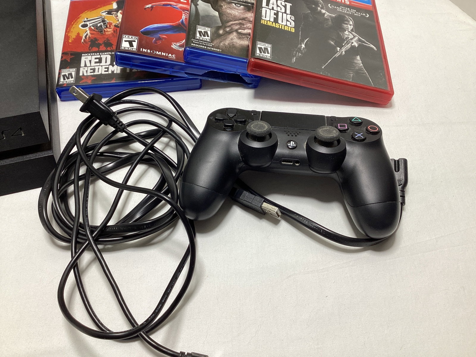 Sony PlayStation 4 Console with Games - 2