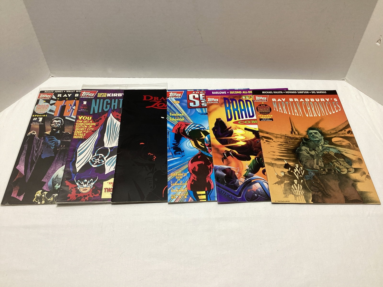 Six Topps Comic Books: .