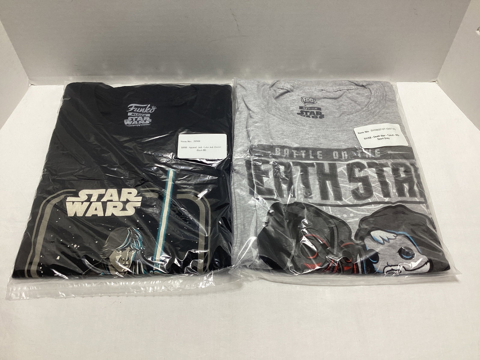 Two Medium Star Wars Smugglers Bounty Funko Pop T-Shirts: .