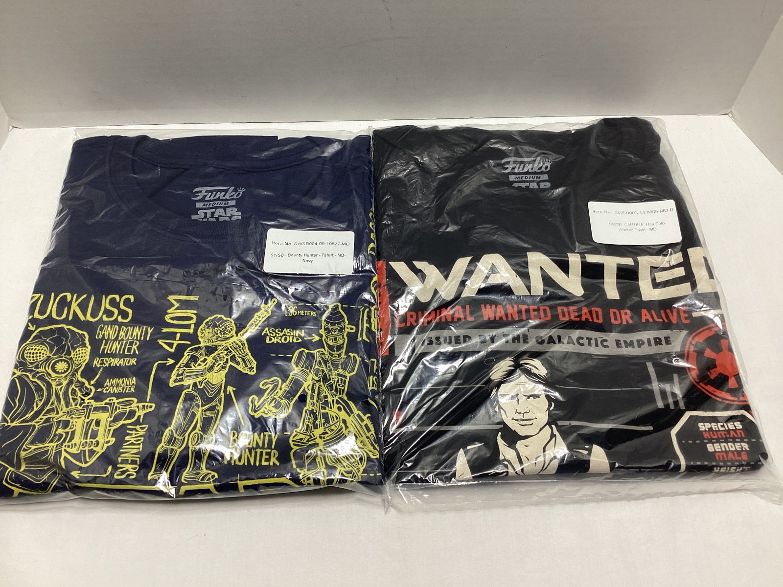 Two Medium Star Wars Smugglers Bounty Funko Pop T-Shirts: .