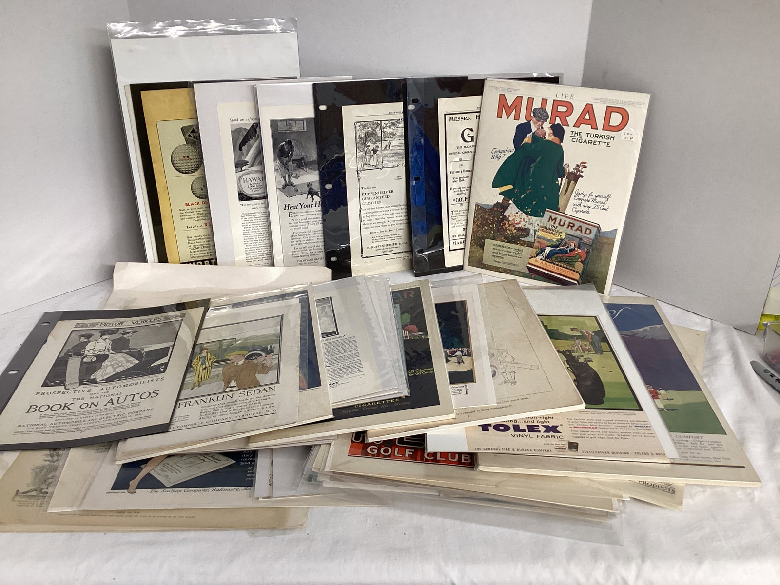 Golf Themed Magazine Advertisements: most are wrapped with boards