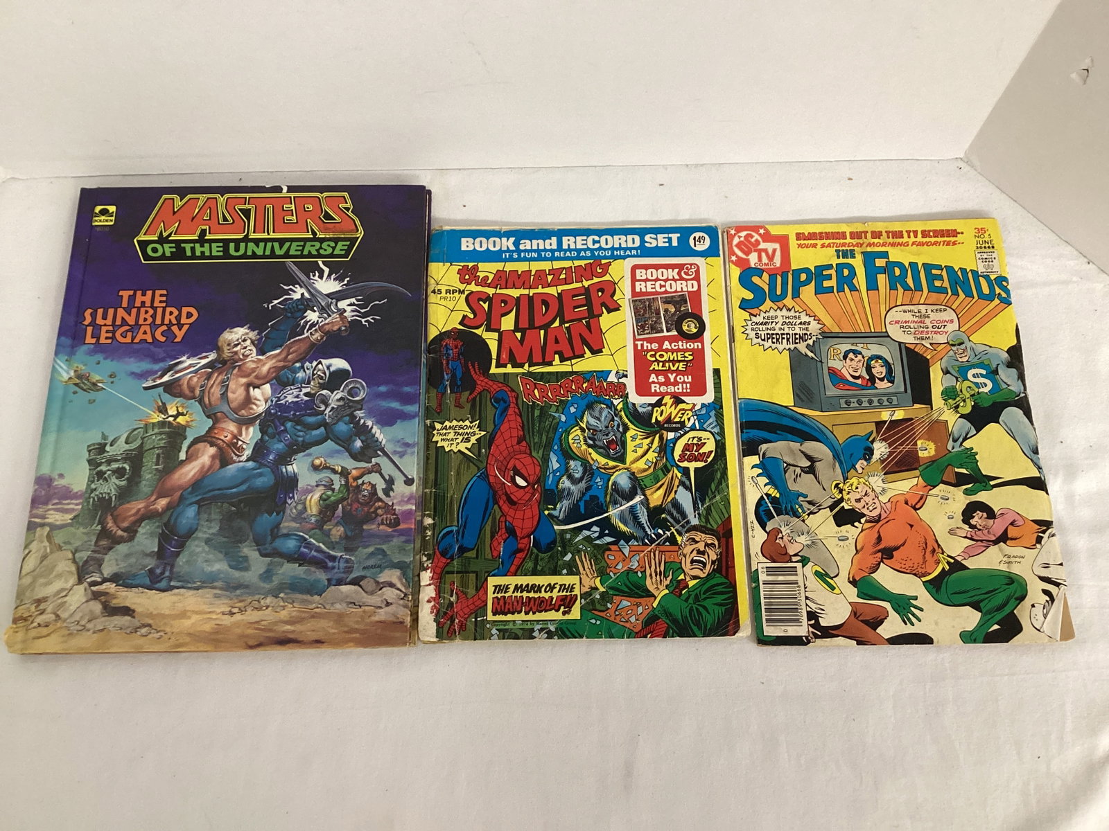 Masters of the Universe Book, Spider-Man Book & Record, Super Friends Comic Book (1 of 10)