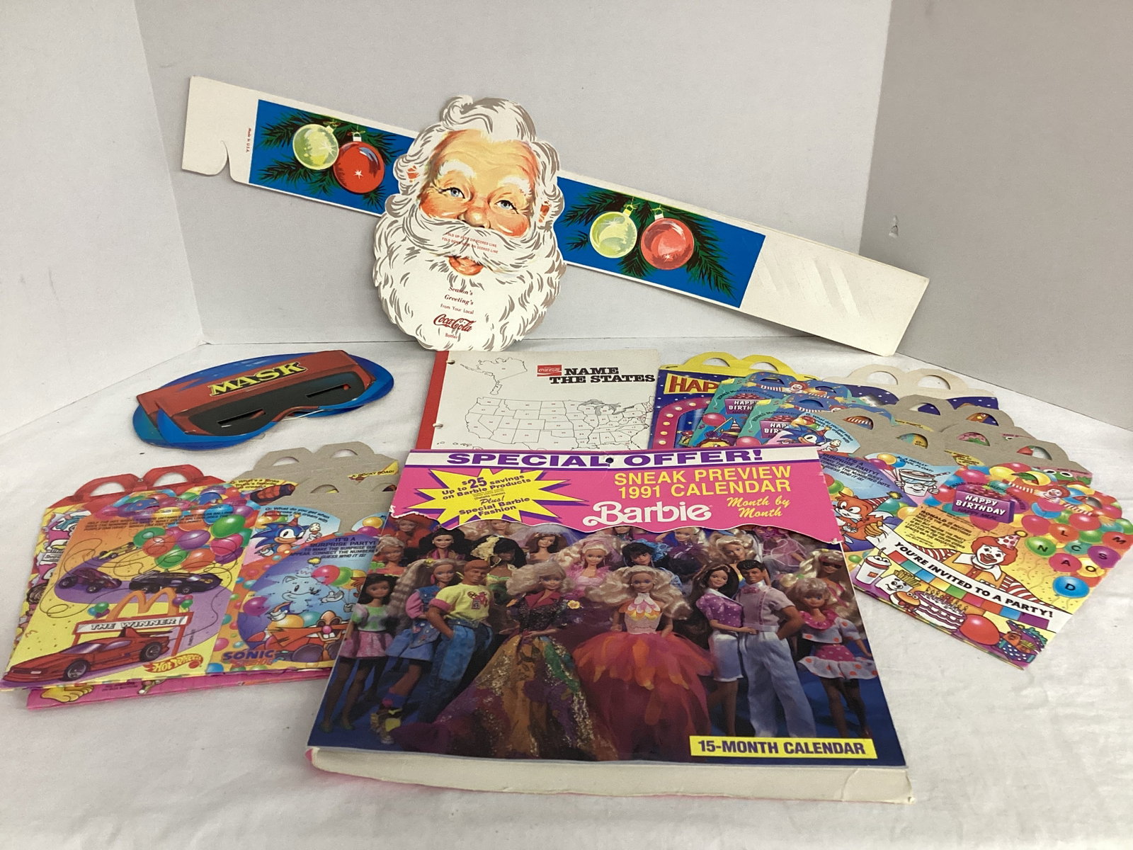 Coca-Cola Santa Headband and 50 States Notebook, McDonalds Happy Meal Boxes, Barbie Calendar: .