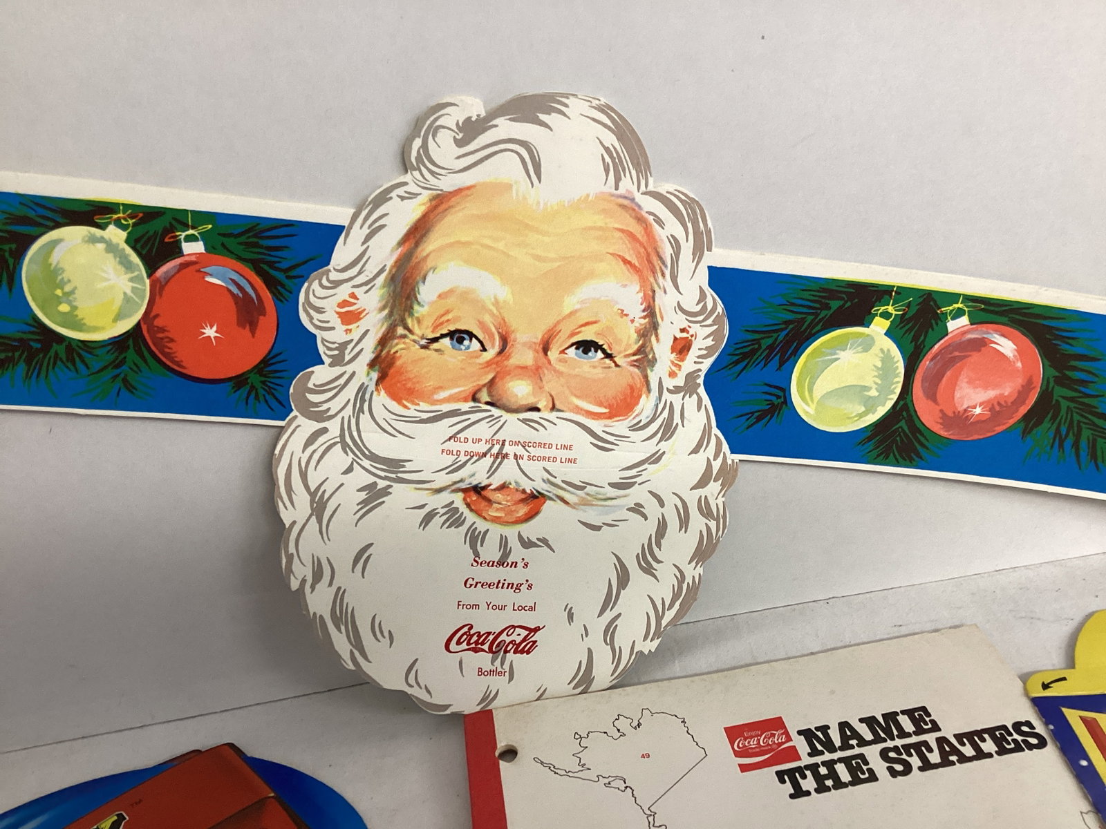Coca-Cola Santa Headband and 50 States Notebook, McDonalds Happy Meal Boxes, Barbie Calendar - 3