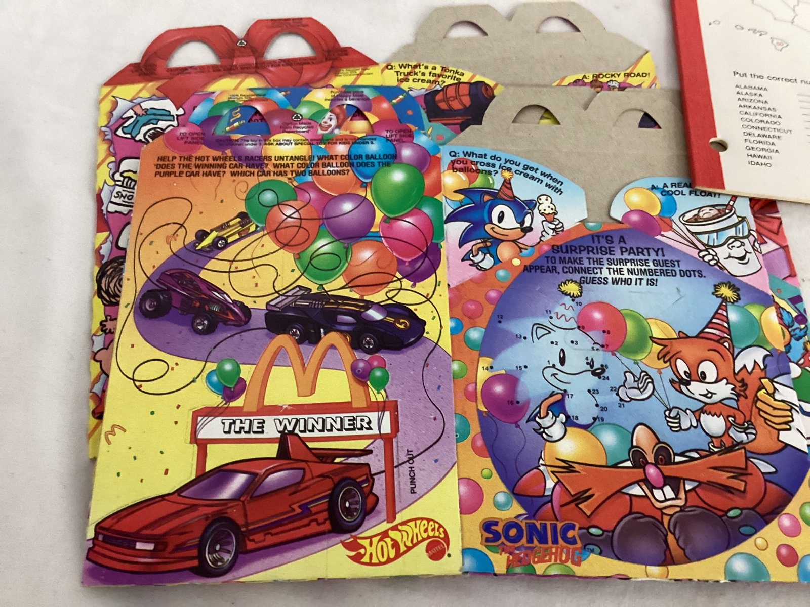 Coca-Cola Santa Headband and 50 States Notebook, McDonalds Happy Meal Boxes, Barbie Calendar - 7