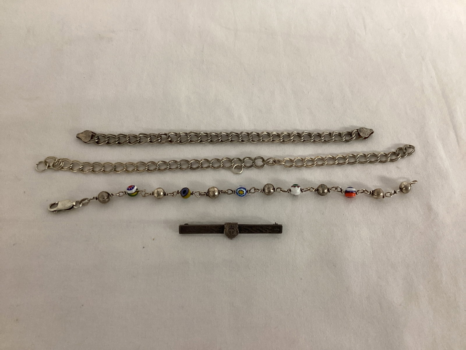 Sterling Pin and Bracelets: one bracelet missing clasps, one not marked
