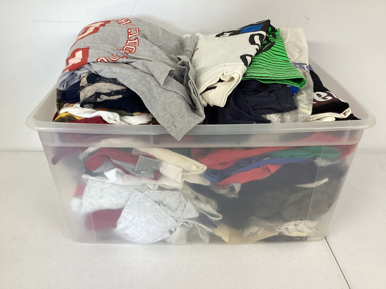 Large Collection of T-Shirts: if shipping required, tote not included