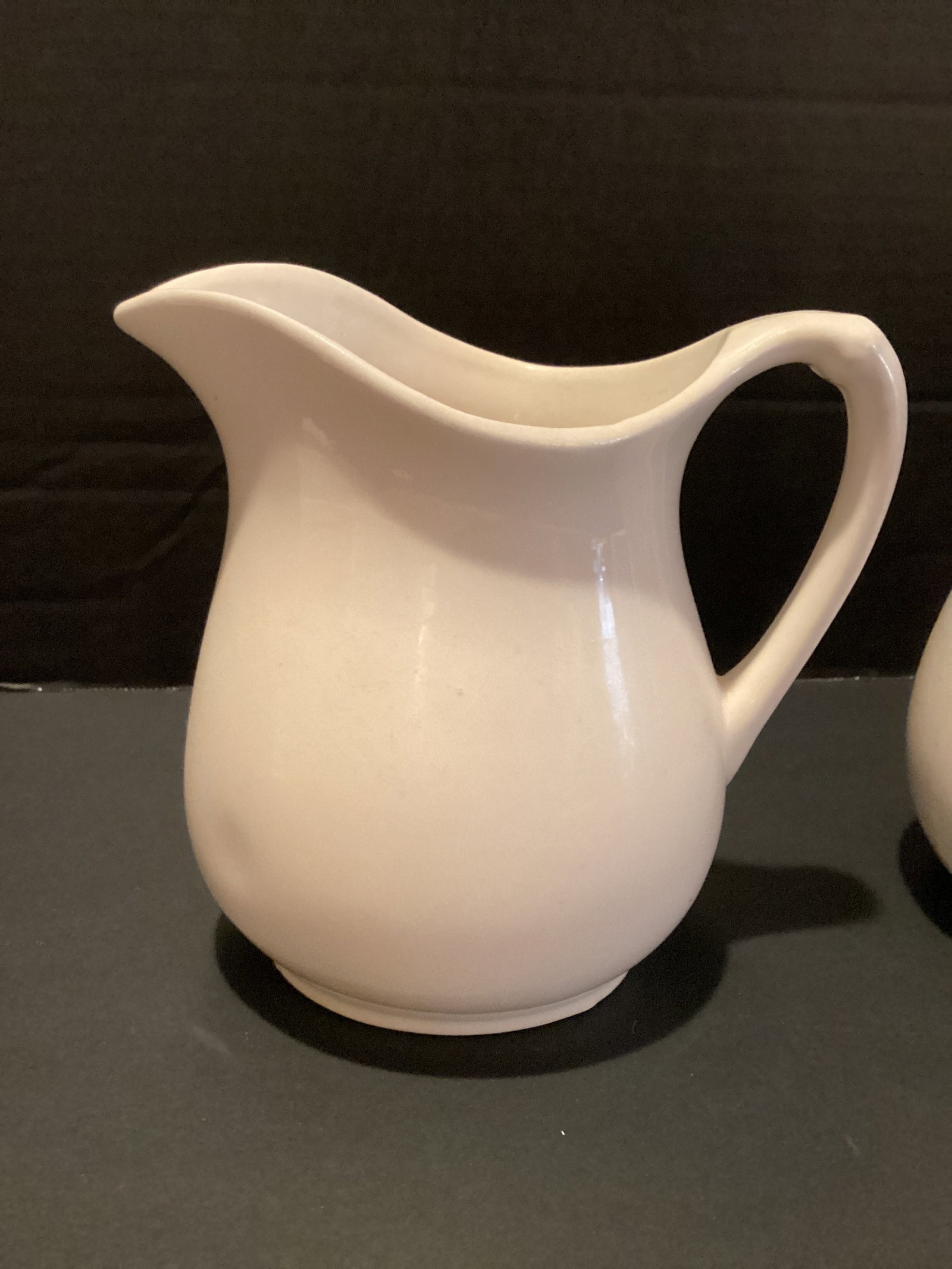 Two White Ceramic Pitchers - 2
