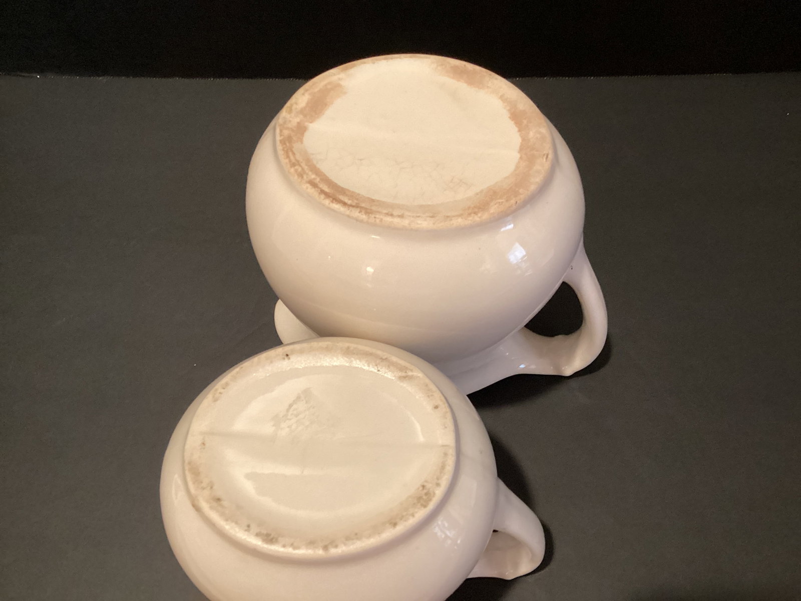 Two White Ceramic Pitchers - 8