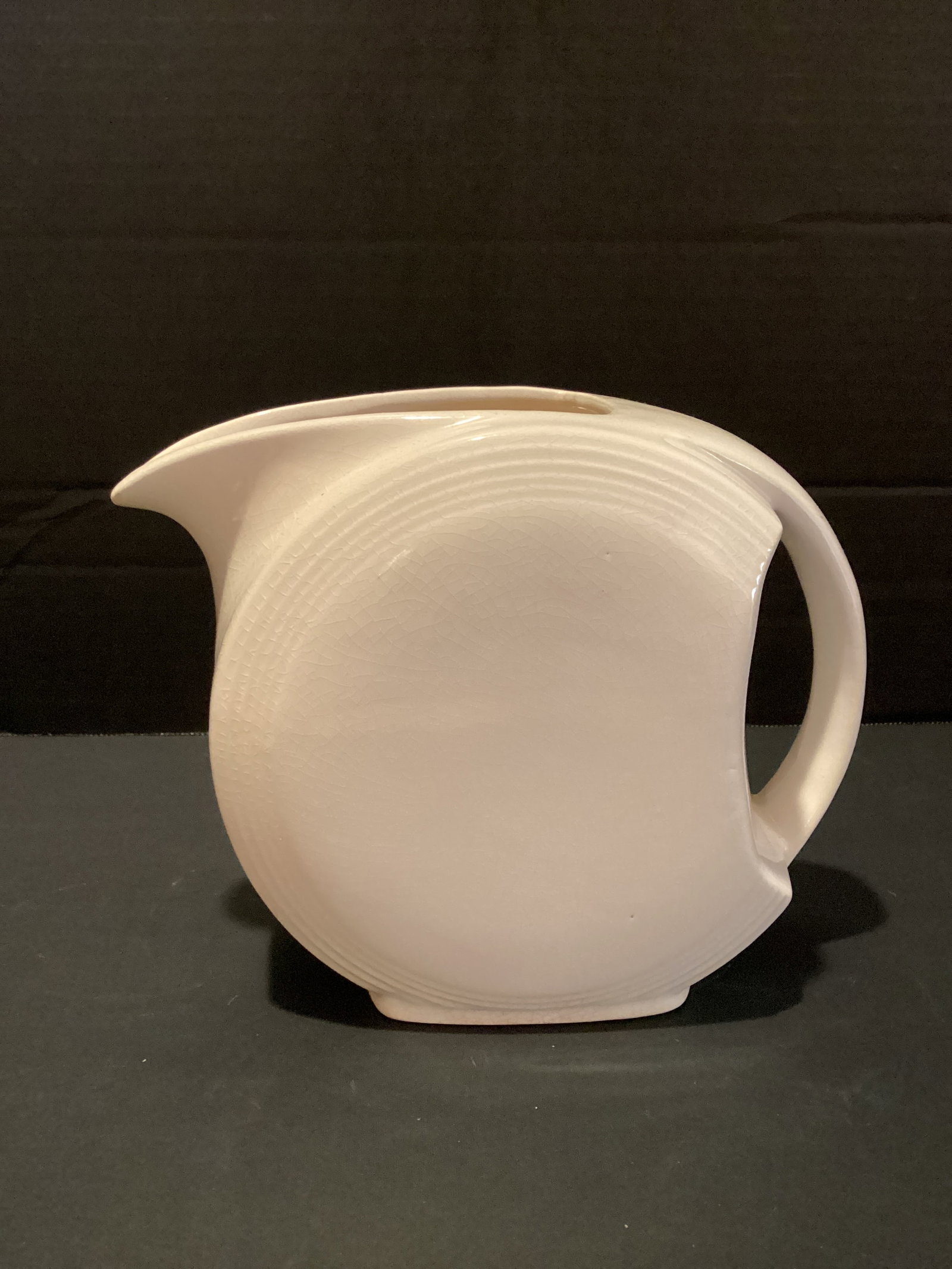 Disk Pitcher: 6 1/4" h, crazing