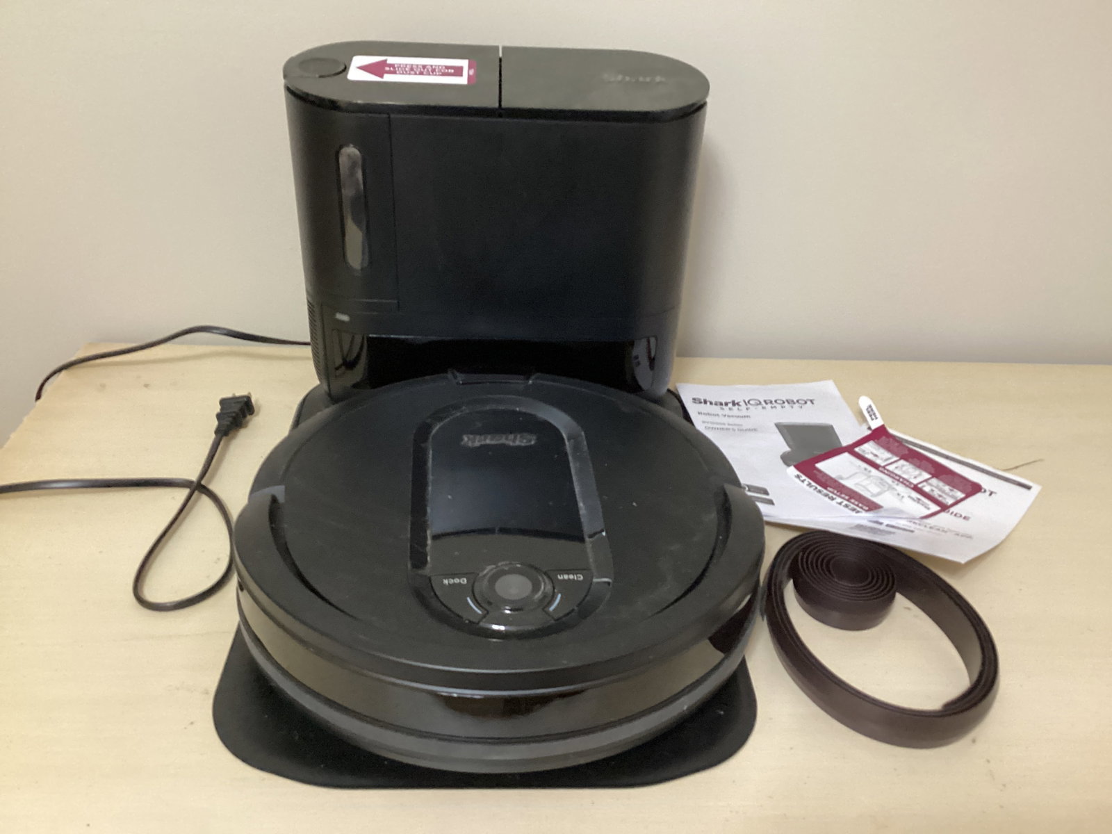 Shark IQ Robot Self Emptying Vacuum Cleaner: works, shipping unavailable for this lot
