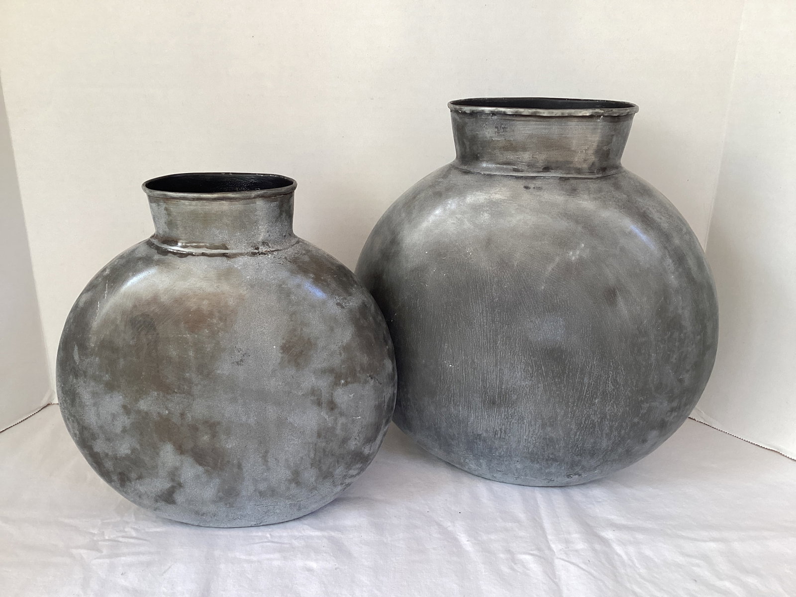 Two Metal Vases: 10 1/2" and 12" h