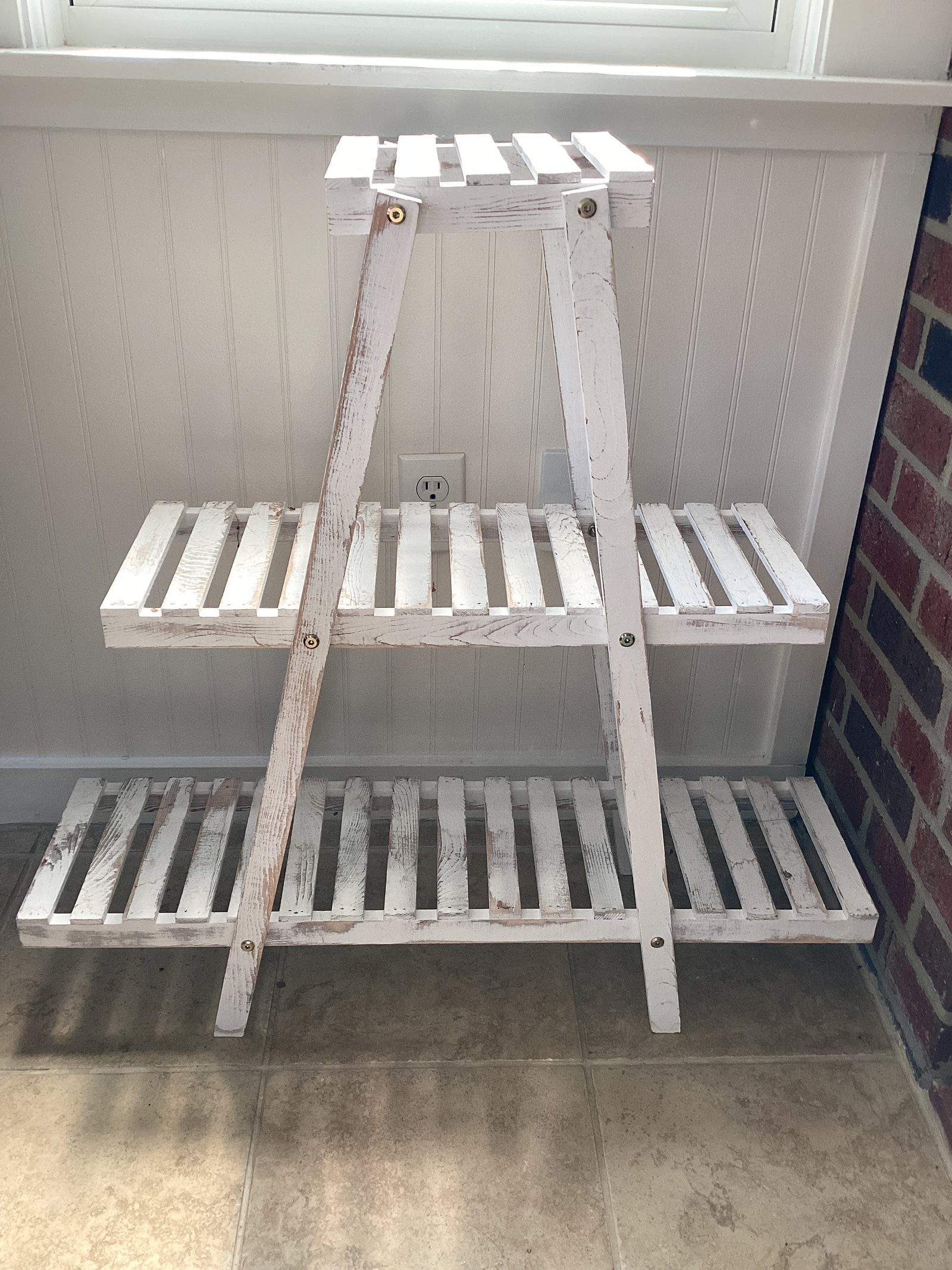 Three Tier Plant Shelf: folds, 32" x 10" x 31" h, shipping unavailable for this lot