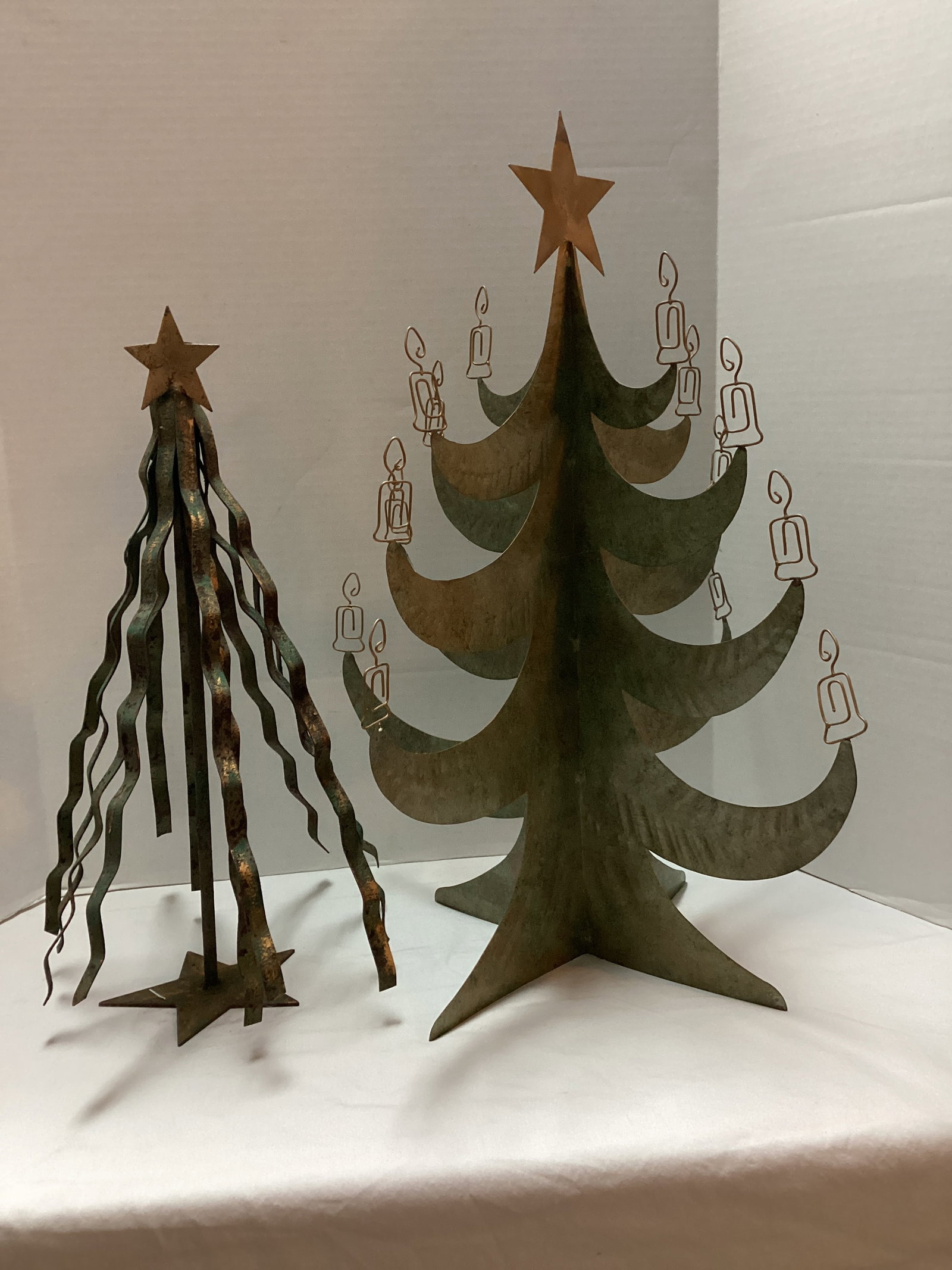 Two Metal Christmas Trees: 19 1/2" and 25" h, shipping unavailable for this lot