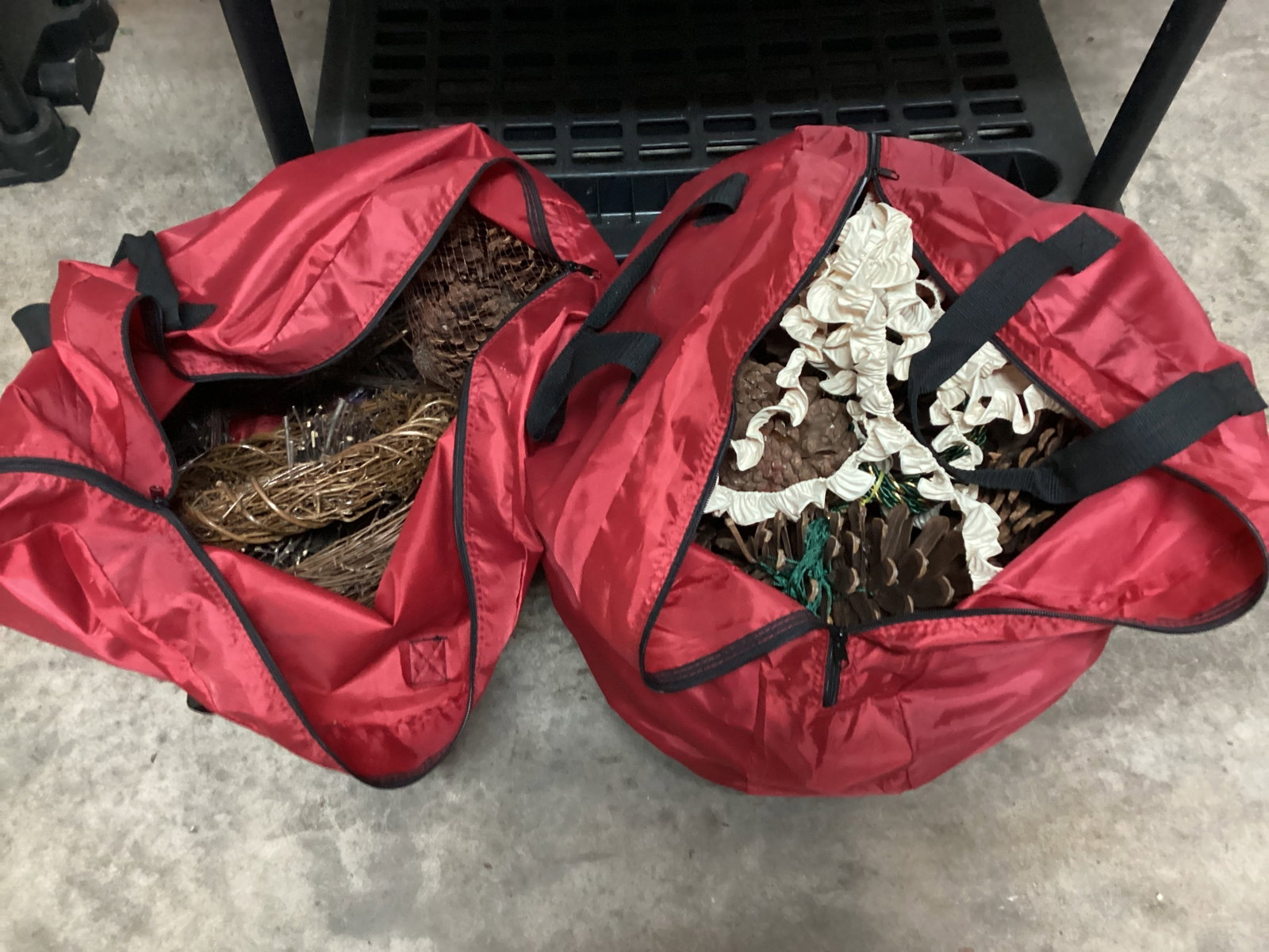 Two Wreath Bags with Large Pinecones and Decorations: shipping unavailable for this lot