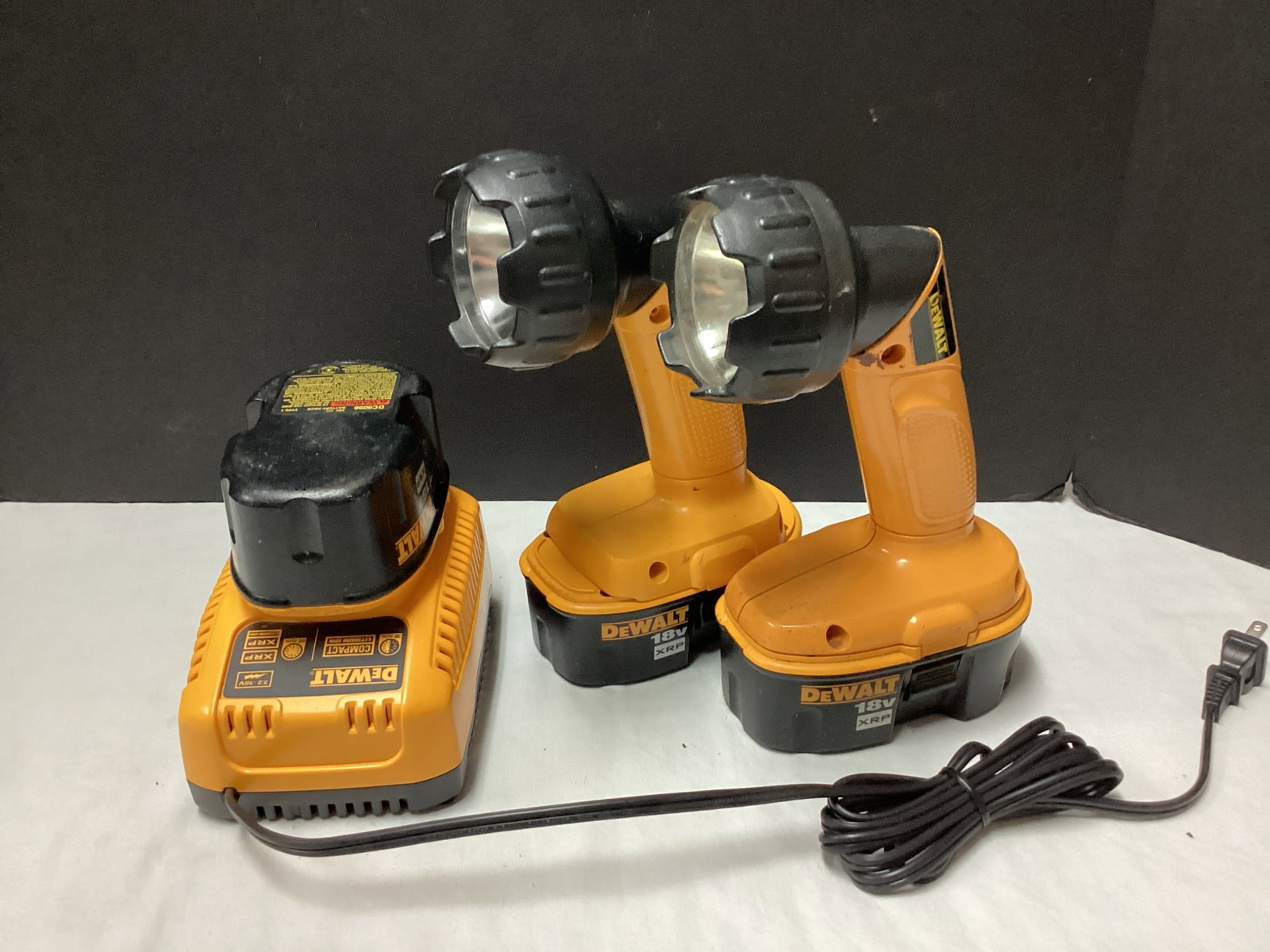 Two DeWalt 18V Flashlights with Three Batteries and Charger: works