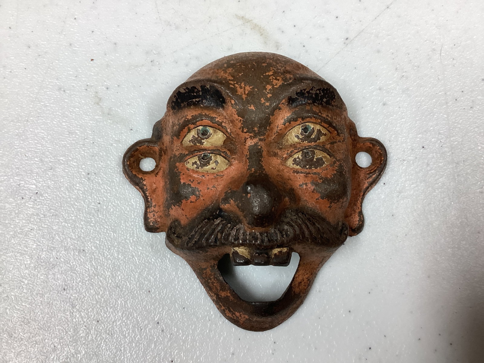 Cast Iron Four Eyed Man Wall Mount Bottle Opener: .