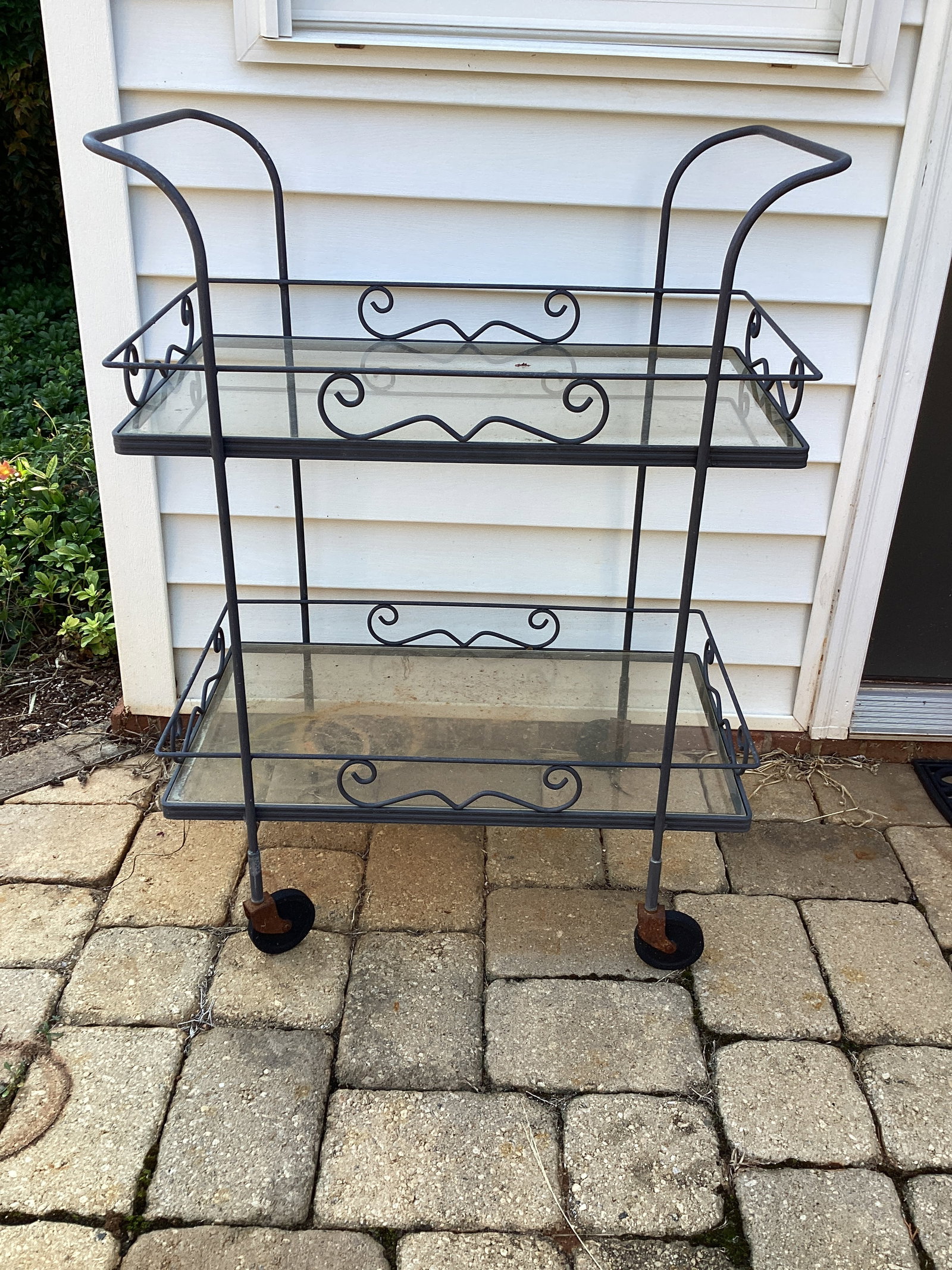 Two Tier Metal Cart with Glass Shelves: some rust, 24 1/2" x 15" x 33" h, shipping unavailable for this lot
