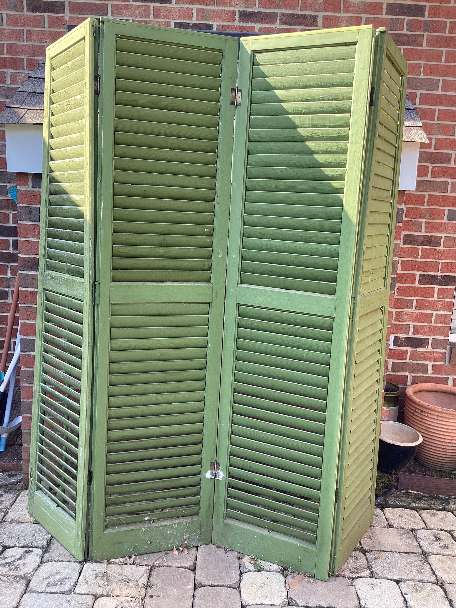 Four Panel Cypress Wood Shutter Screen: paint weathered, from New Orleans, very heavy, bring help to load, 16 1/2" x 68 1/2" each panel, shipping unavailable for this lot